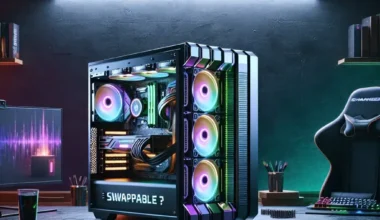 A gaming PC with RGB lighting and a transparent case, placed on a desk with a keyboard and chair in a dimly lit room.